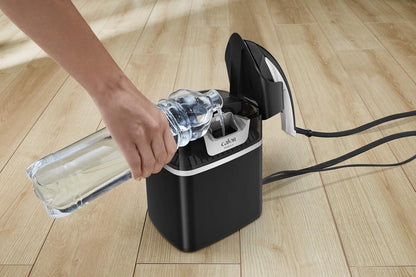 Défroisseur vapeur Calor Ixeo+ QT1510C0 tout-en-un avec planche Smart Board 3 positions, technologie Twin Boiler et pression 5 bars.